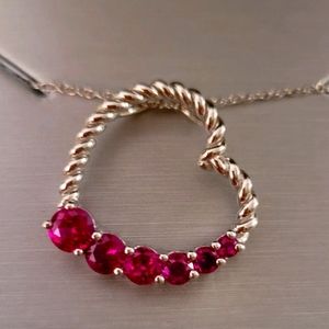 Sterling silver ruby heart pendant on an 18in